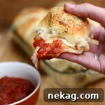 Stuffed Pizza Rolls with cheese and favorite pizza toppings, perfect for dipping in marinara sauce.