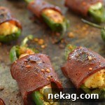 Sweet 'n' Spicy Bacon-Wrapped Jalapeno Poppers, bite-sized appetizers with addicting zippy flavor.