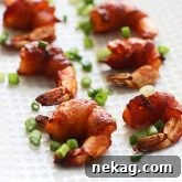 3 Ingredient Bacon Wrapped Buffalo Shrimp, crazy addictive and only require three ingredients!