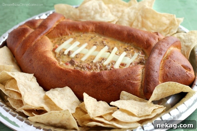 Overhead shot of the football-shaped bread bowl, ready to be filled with dip.