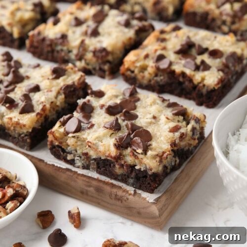 Close up of German Chocolate Bars showing the brownie crust, coconut pecan topping, and chocolate chips.