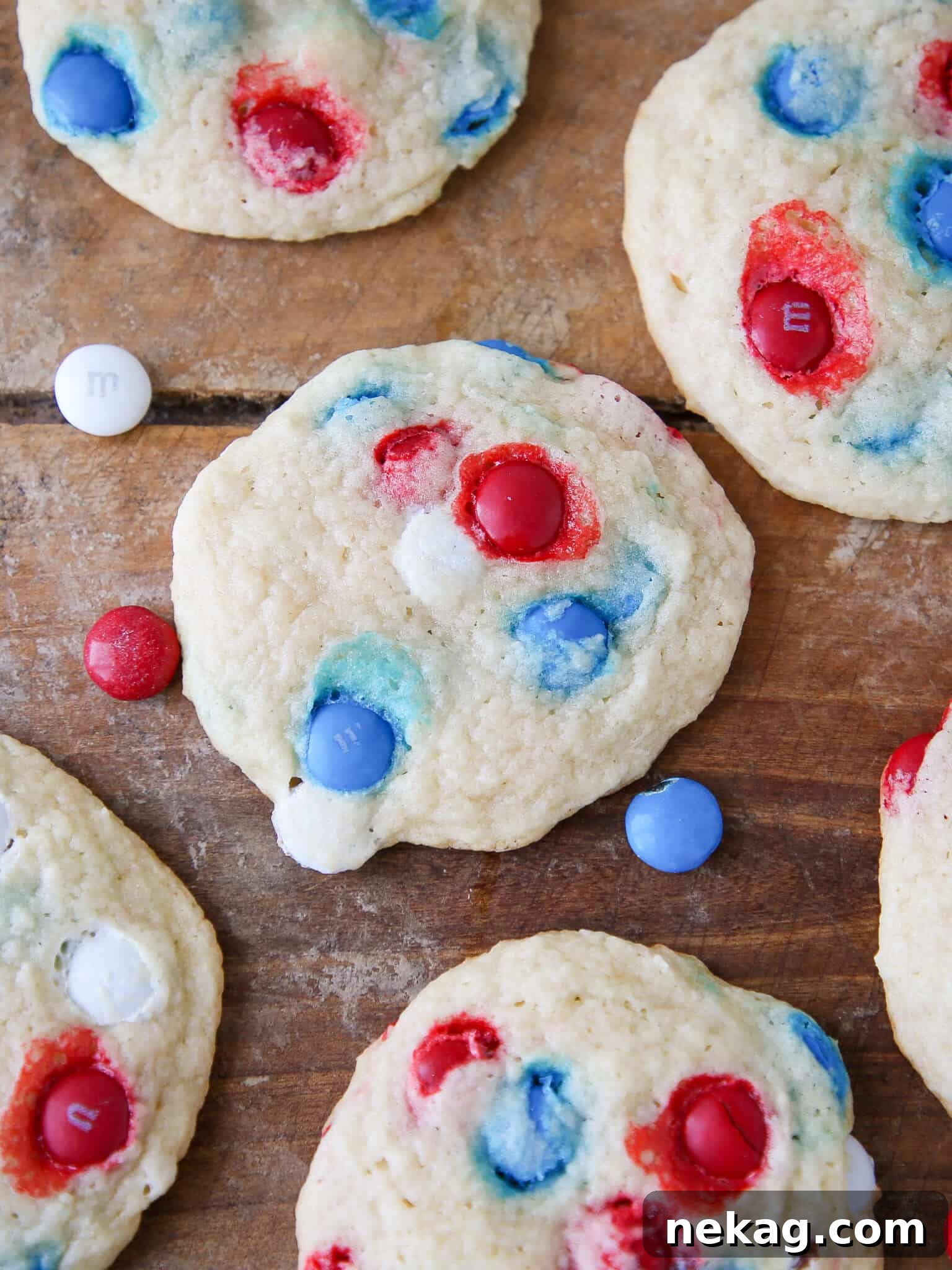 Patriotic M&M Sugar Cookies on wooden surface detailed