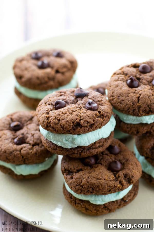 Ingredients for chocolate mint cream cookie sandwiches laid out, including double chocolate cookies and mint cream filling.