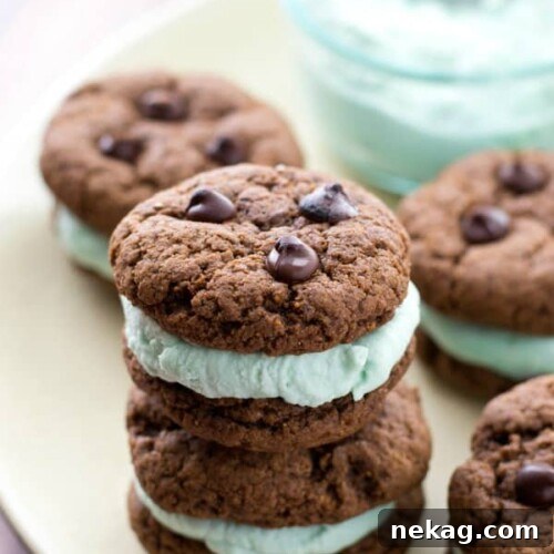 Chocolate Mint Cream Cookie Sandwiches – a close-up of the assembled cookies, showing the rich chocolate and vibrant green mint filling.