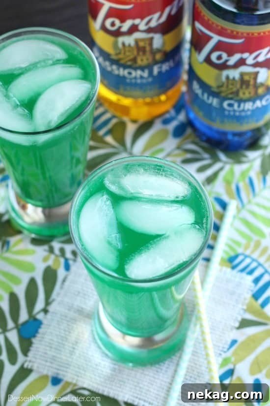 Xanadew FIIZ Clone 3 Xanadew - The iconic FIIZ soda shop copycat drink featuring blue curacao and passion fruit syrups blended with Mountain Dew for a fun green tropical mocktail.