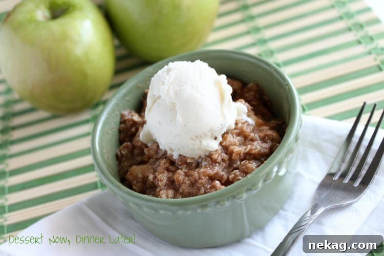 Your Own Apple Crisp Video Recipe 3 Close-up of the delicious, golden-brown crumb topping on a single serving apple crisp.