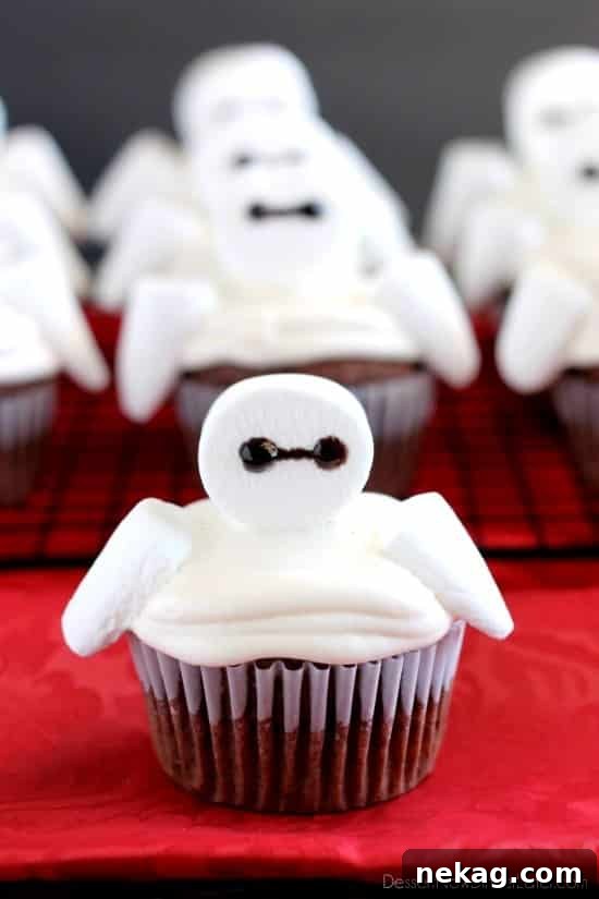 Sweet Baymax Treats from Big Hero 6 14 Adorable Baymax Cupcakes for a Big Hero 6 themed party or movie night.
