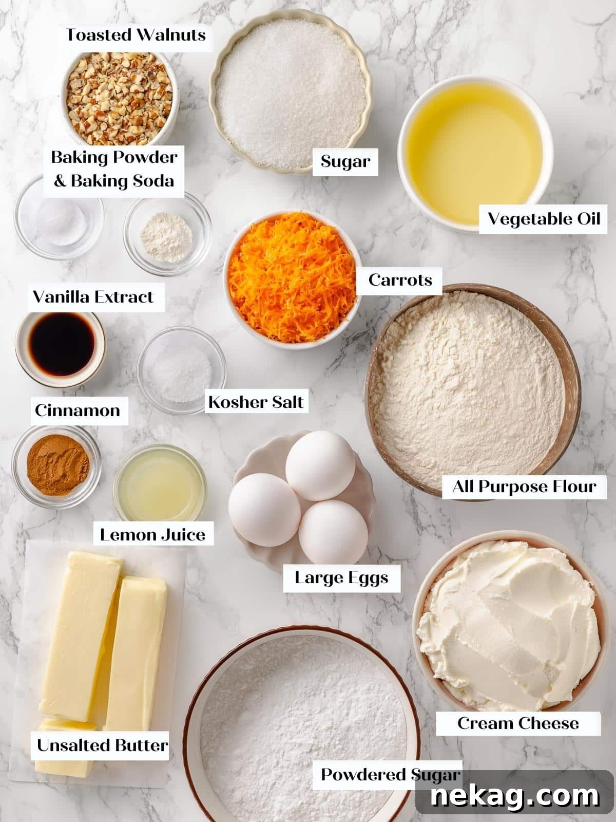 Fresh, prepped ingredients for carrot cake neatly arranged on a kitchen counter.