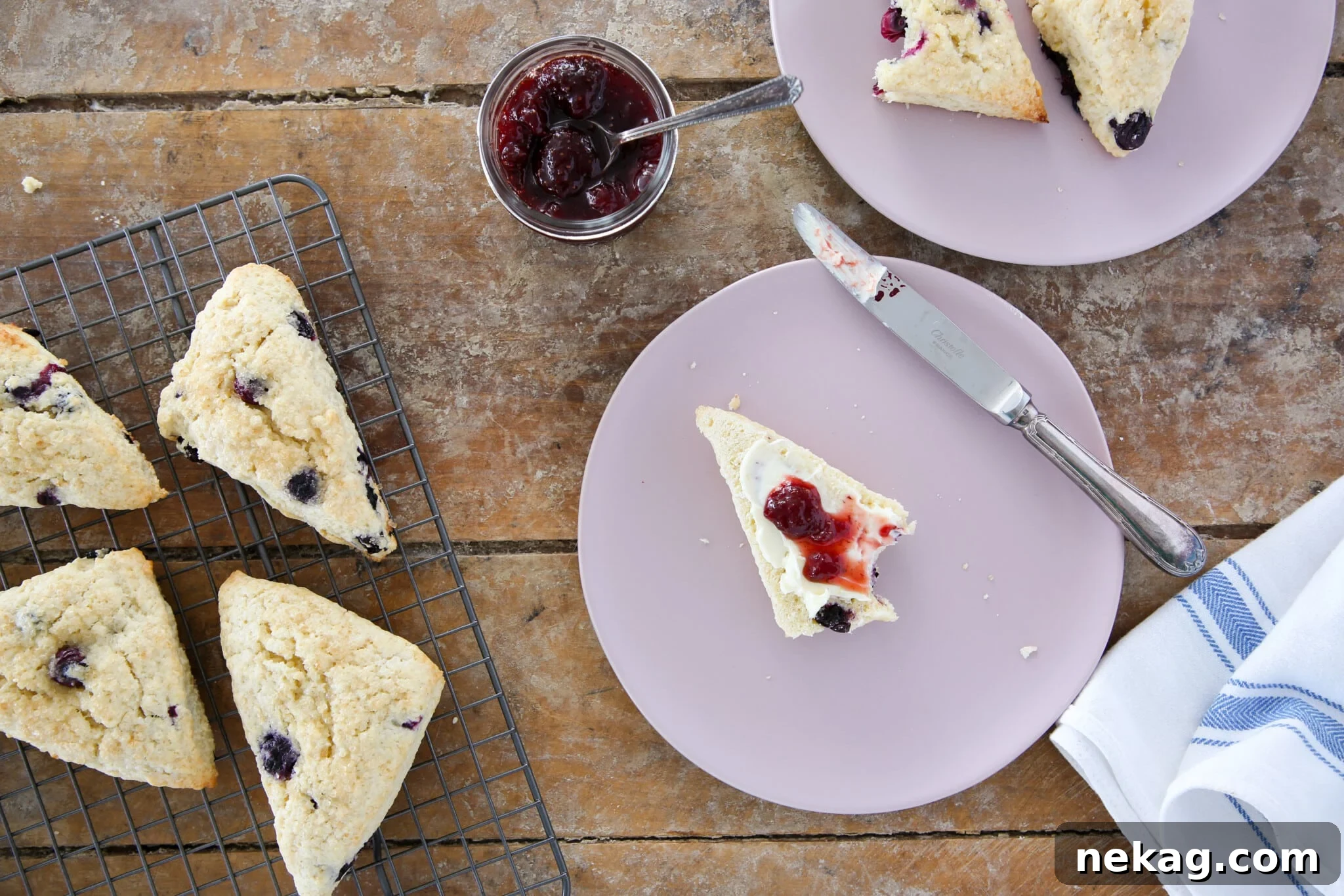 Delicious Blueberry Scones 5 Beautifully arranged blueberry scones on a wire cooling rack