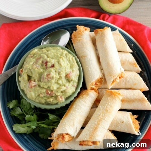 These Zesty Baked Chicken Taquitos are creamy and cheesy with a special ingredient to make them bold and zesty! A simple guacamole recipe is also included!