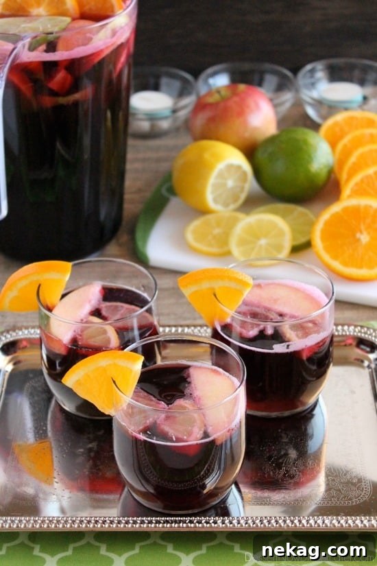 Easy Virgin Sangria - only 2 ingredients plus fresh cut fruit. A bubbly, fruity drink perfect for any party!