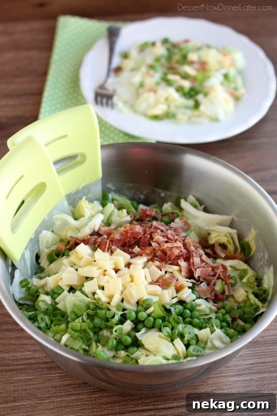 Sarah's Salad A Lion House Specialty 6 A large bowl of Sarah's Salad, freshly tossed and ready to serve at a gathering, highlighting its appeal for potlucks and family meals.