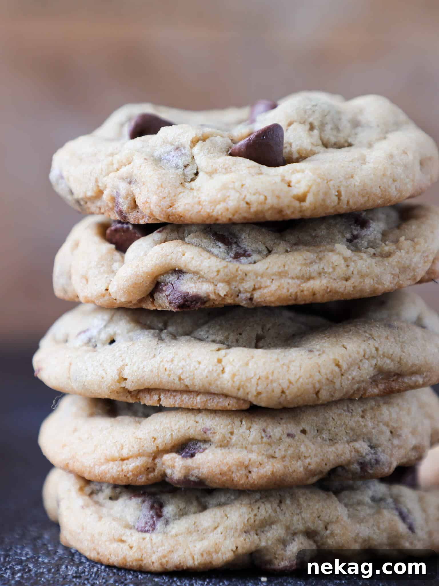 New York Times Chocolate Chip Cookies stacked wood background