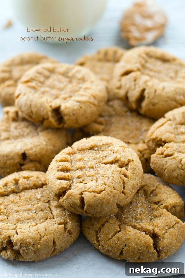 Unbelievably soft and chewy and loaded with a double-delight of browned butter and peanut butter, these addicting sugar-coated cookies will be requested again and again! @WholeHeavenly
