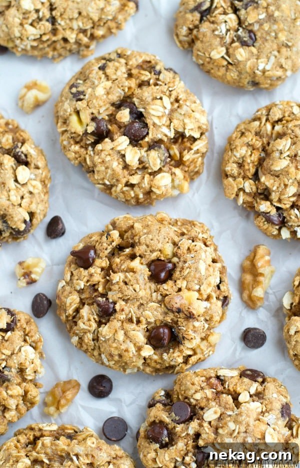 Jam-packed with peanut butter, banana, gooey chocolate and lots of other goodies, these loaded, ultra-chewy oatmeal cookies are sure to become a cookie jar staple! @WholeHeavenly