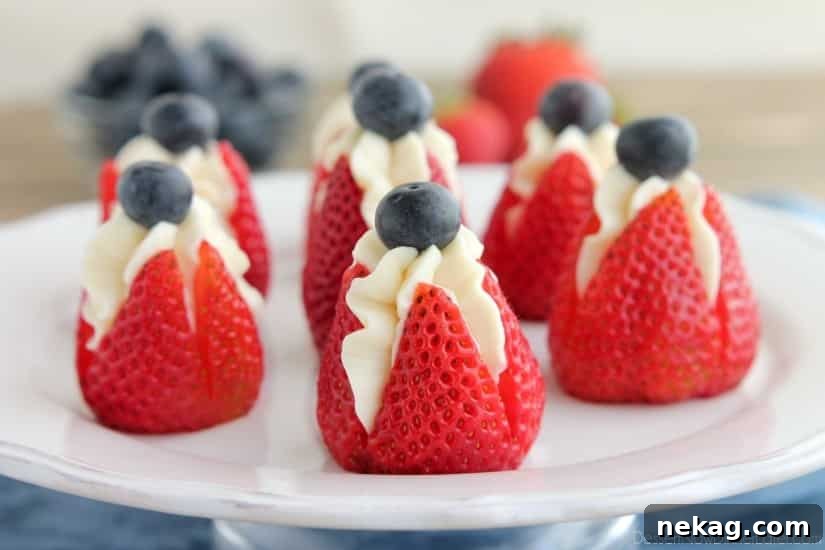 Strawberry Cheesecake Delights 7 Platter of cheesecake stuffed strawberries, showcasing their deliciousness.