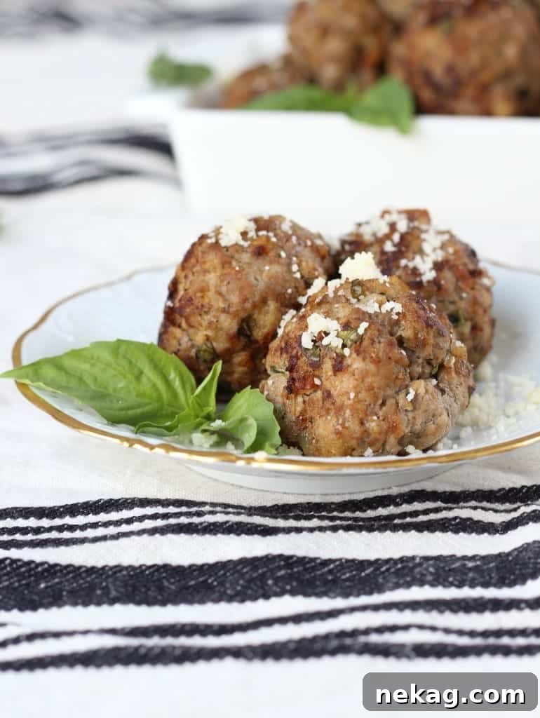 Nonna's Italian Meatballs 4 All the essential ingredients for making Italian Meatballs artfully arranged on a wooden table