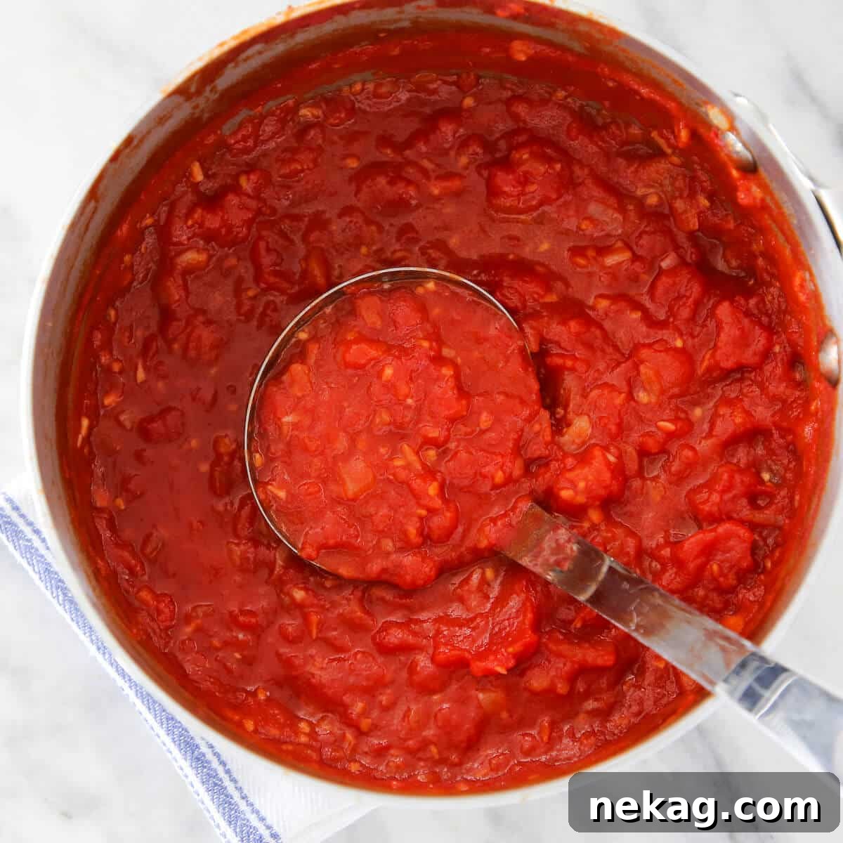 Effortless Homemade Pasta Sauce 2 15 Minute Pasta Sauce bubbling gently in a pot on the stove, ready to be served with pasta.