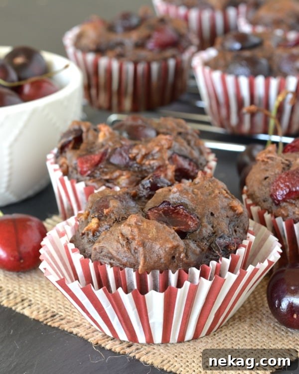 Decadent Chocolate Cherry Banana Bread Muffins 5 A plate of warm Chocolate Cherry Banana Bread Muffins, ready for serving.