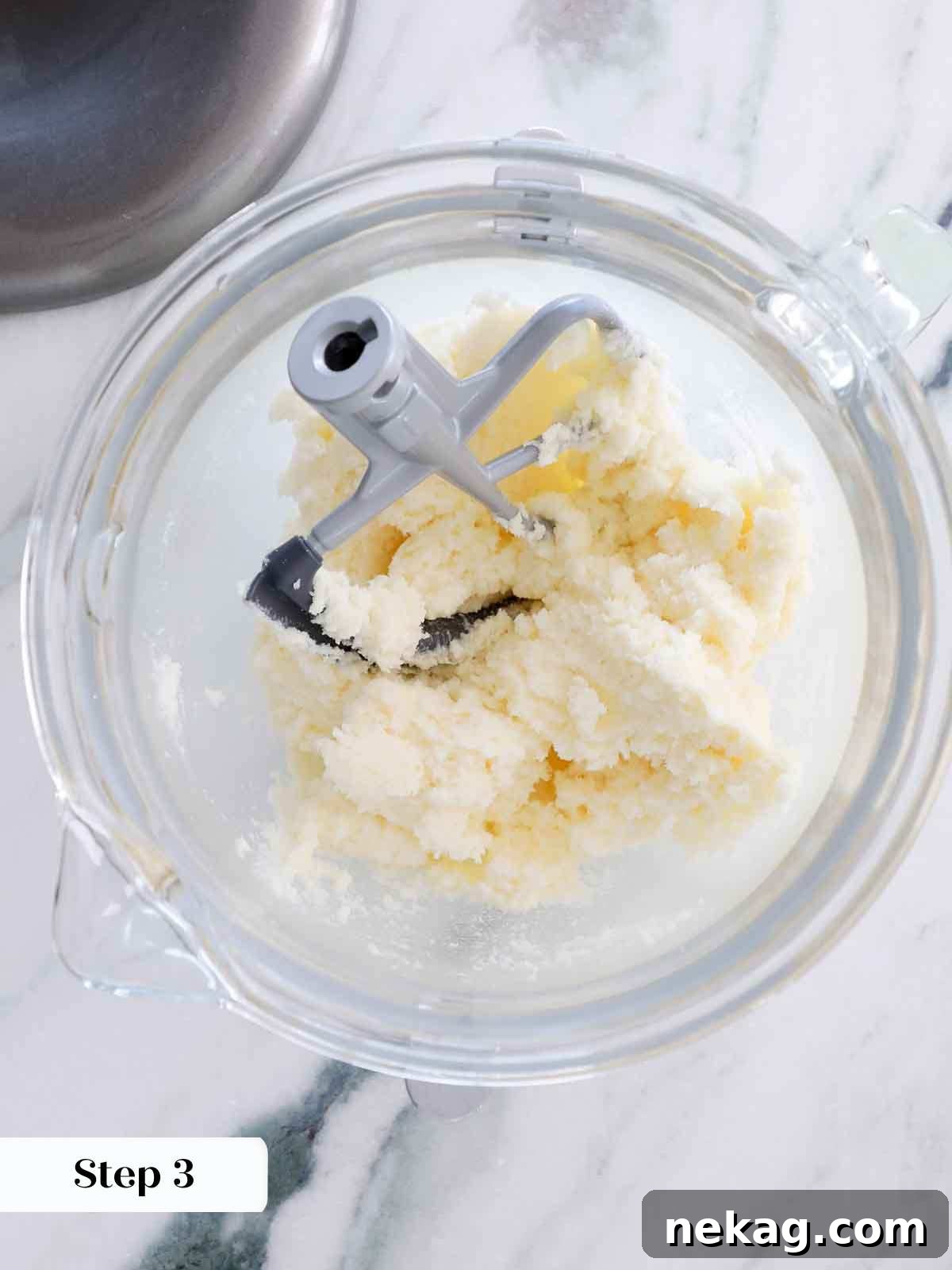 creamed butter and sugar for moist vanilla cake, showing a light and fluffy texture.