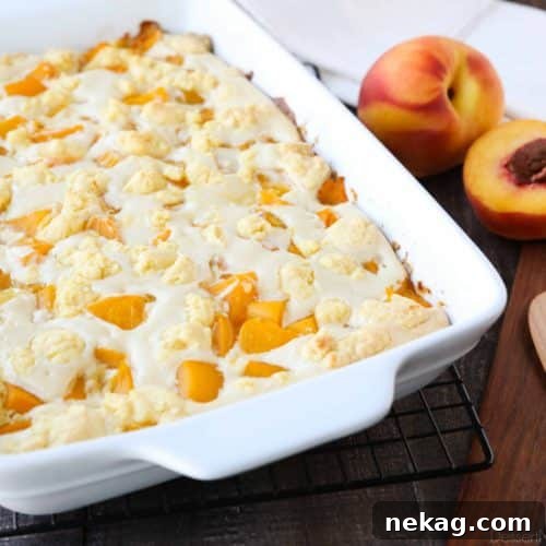 Peach cobbler meets cheesecake in this delicious dessert duo! An easy and unique twist from a traditional peach cobbler. There's cake mixture on bottom and on top, with peaches and cheesecake in-between.