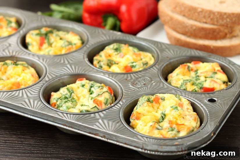 A delicious Breakfast Egg Cup topped with a dollop of fresh salsa, ready to be served.