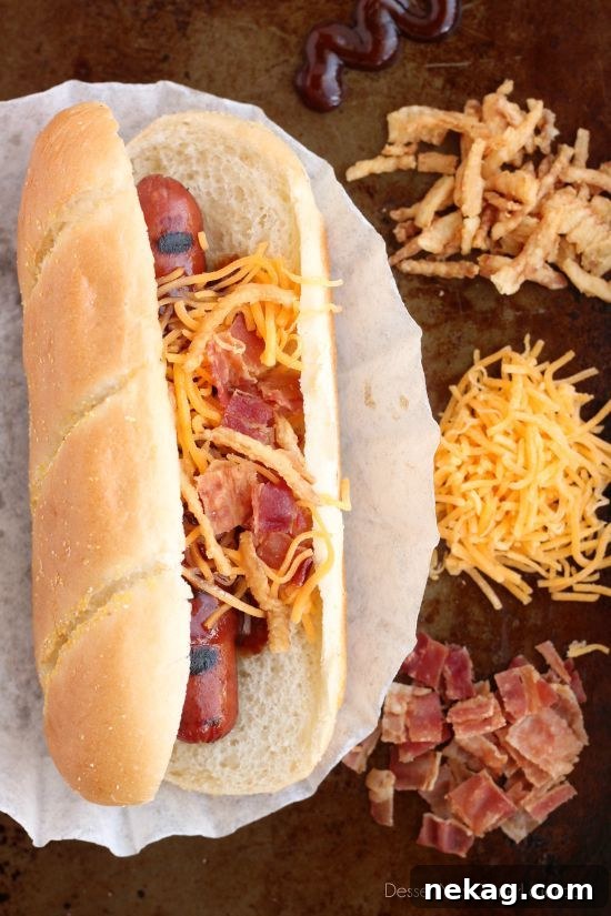 Indulge in the bold flavors of the West with this gourmet Western Hot Dog, featuring Ball Park Park's Finest hot dogs, BBQ sauce, crispy fried onions, cheddar cheese, and real bacon bits.