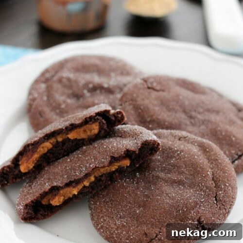 Delicious Peanut Butter Stuffed Chocolate Cookies, featuring a rich chocolate exterior and a creamy peanut butter center.