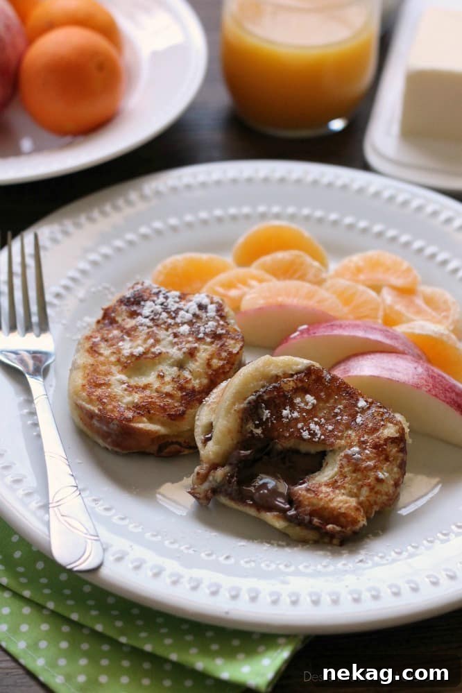 Chocolate Stuffed French Toast, perfectly golden brown with a hint of melted chocolate peeking out, ready for a delicious breakfast.