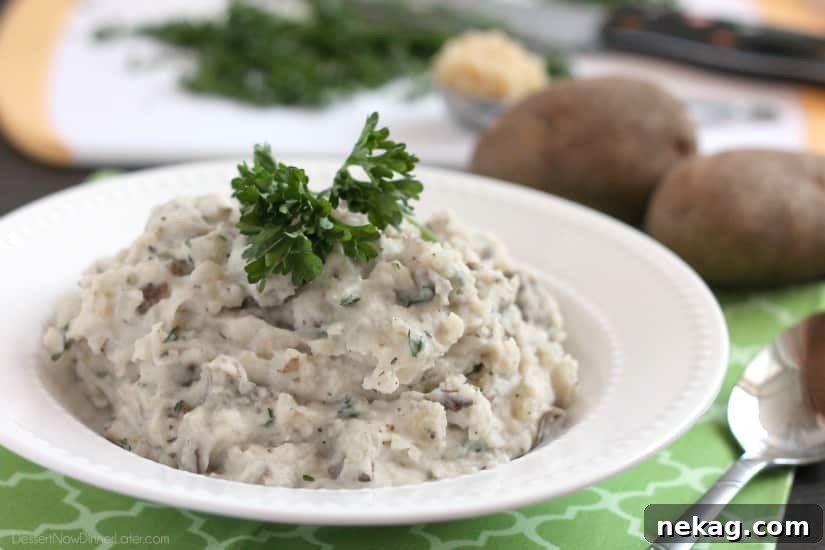 A serving of flavorful garlic herb mashed potatoes.