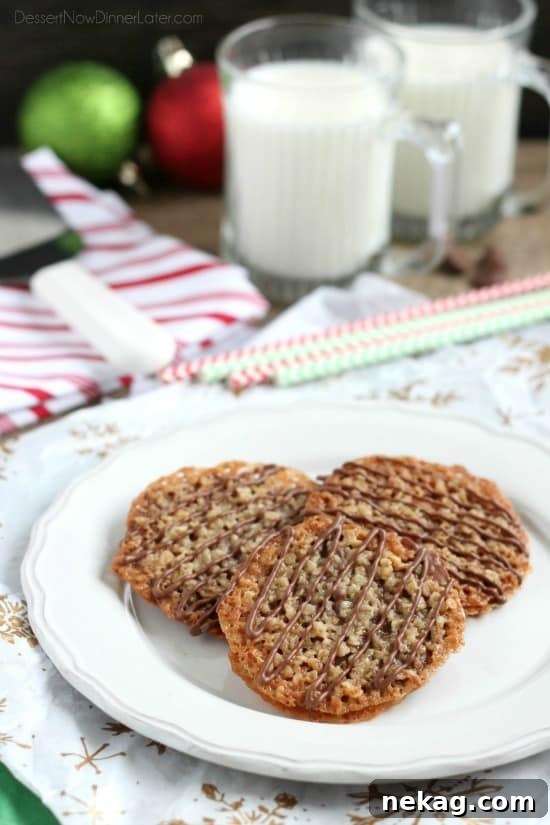 Golden Oat Florentine Laces 2 Thin, crisp, buttery cookies are sandwiched between melted milk chocolate with an extra chocolate drizzle on top. They taste like toffee and they look like lace. These Florentine Cookies are a holiday favorite!