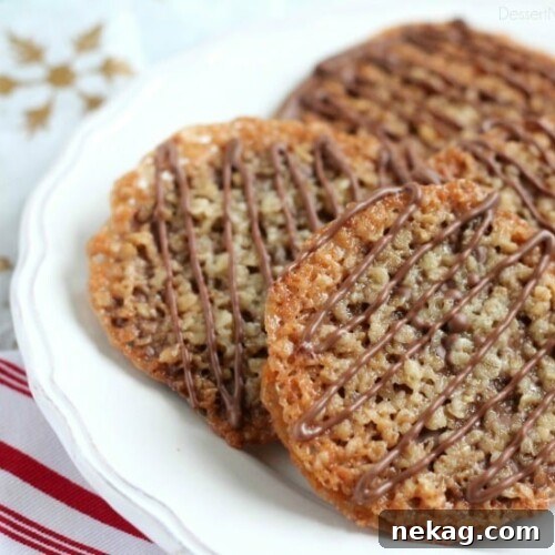Golden Oat Florentine Laces 7 Thin, crisp, buttery cookies are sandwiched between melted milk chocolate with an extra chocolate drizzle on top. They taste like toffee and they look like lace. These Florentine Cookies are a holiday favorite!