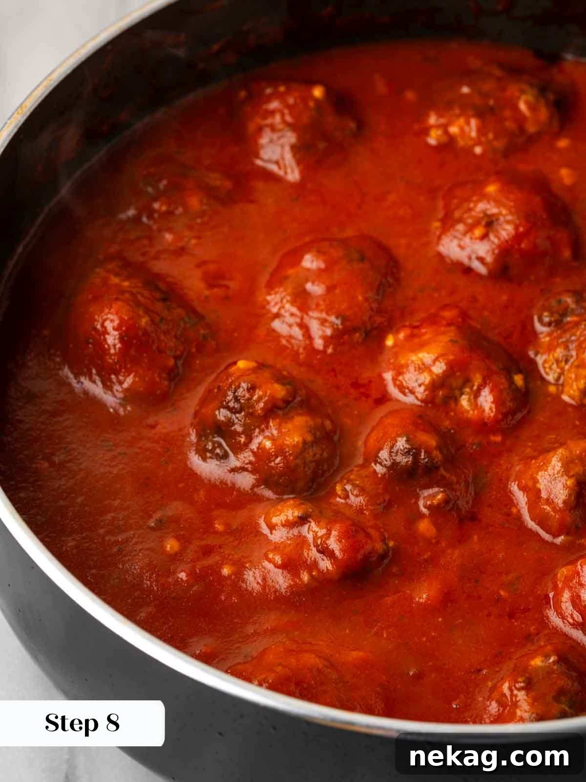 Cloud-Like Ricotta Meatballs 10 Perfectly seared ricotta meatballs gently simmering in a vibrant red tomato sauce.