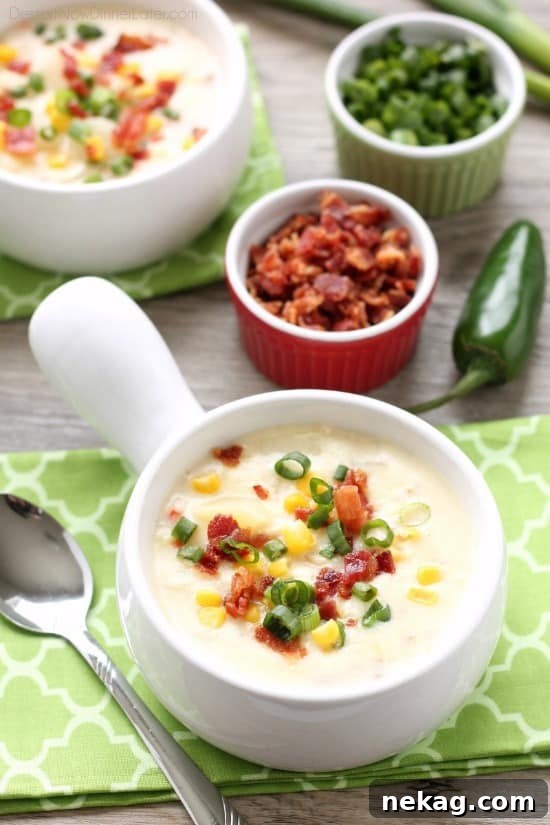 11 Scrumptious Soups Featuring Creamy Chicken and Corn Chowder 2 This Creamy Chicken and Corn Chowder is hearty and comforting with generous helpings of chicken, corn, bacon, green onions, potatoes and a slight kick of jalapeño.