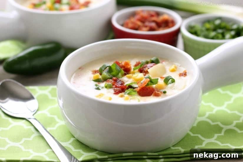 11 Scrumptious Soups Featuring Creamy Chicken and Corn Chowder 4 This Creamy Chicken and Corn Chowder is hearty and comforting with generous helpings of chicken, corn, bacon, green onions, potatoes and a slight kick of jalapeño.