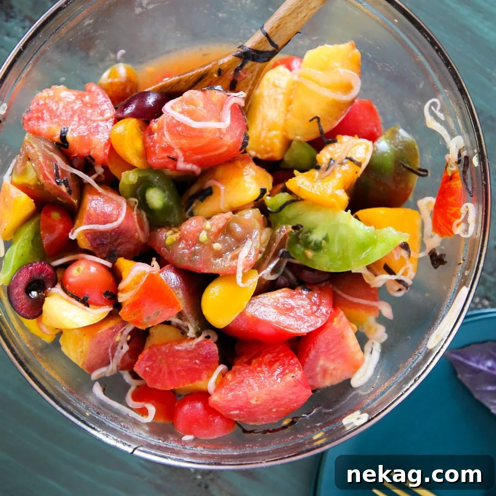 Close-up of Marinated Tomato Stone Fruit Salad ingredients