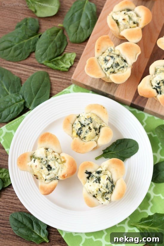 Artichoke Spinach Blossom Bites 4 Creamy Spinach Artichoke Dip is baked in the center of bread cups that are shaped to look like blooming flowers. A fun and delicious Easter appetizer.