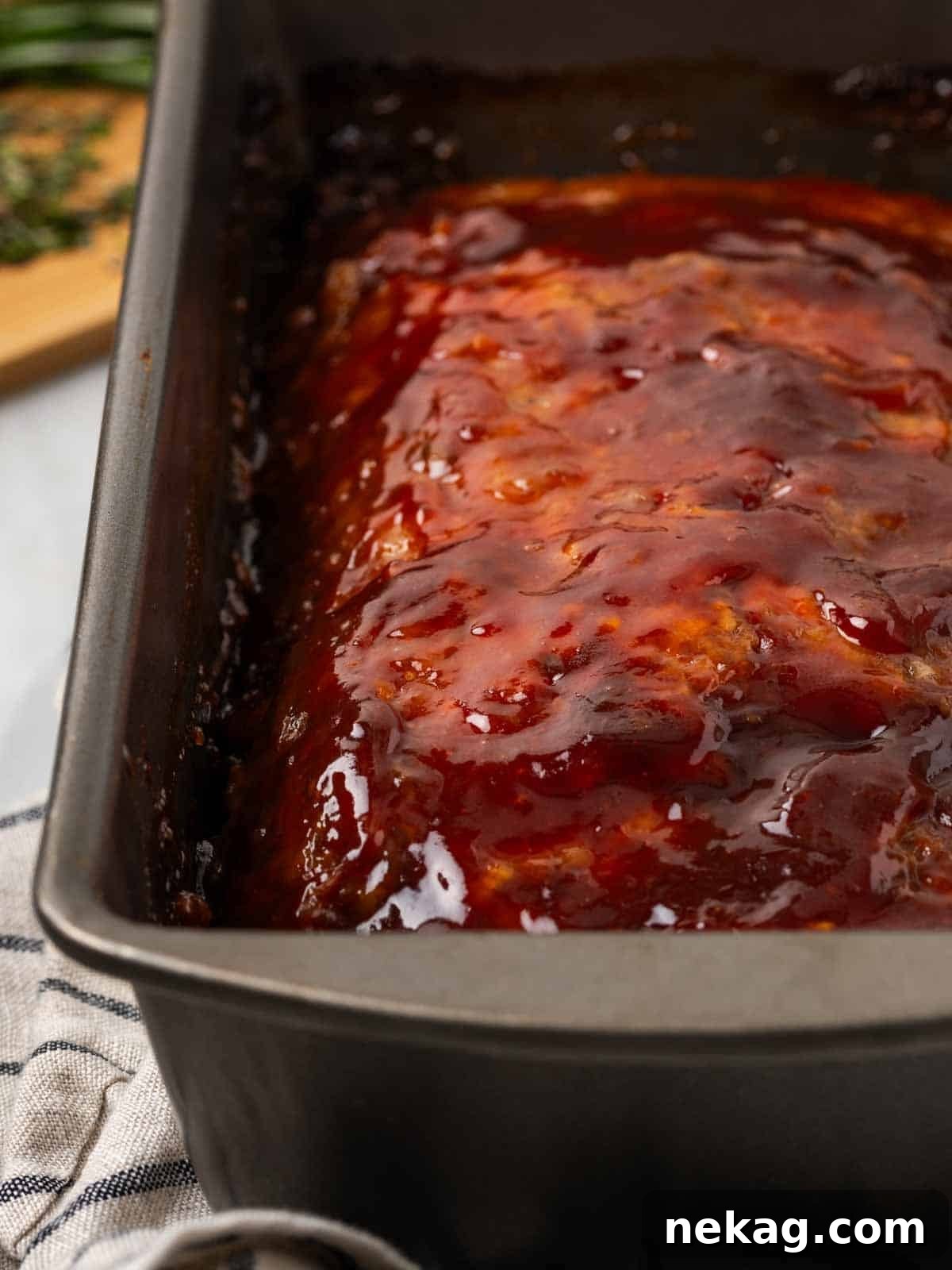 Sweet and Sticky Brown Sugar Meatloaf 8 brown sugar meatloaf baked in pan.