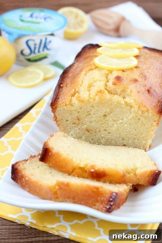 Dairy-Free Sunshine Lemon Yogurt Cake 6 Pouring lemon syrup over the freshly baked lemon yogurt cake.