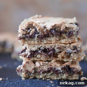 Chocolate Halfway Bars stacked with melted chocolate drizzle