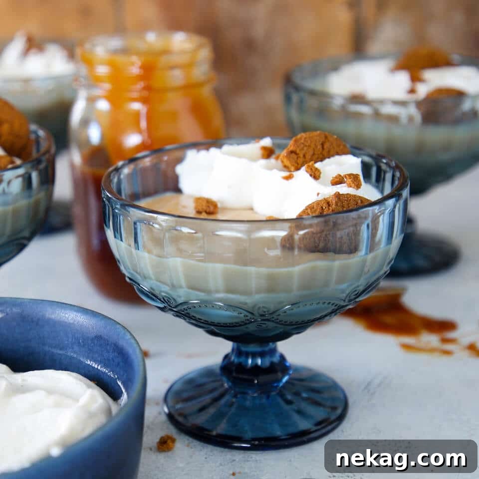Golden Caramel Delight 3 A blue cup filled with caramel pudding, ready to be enjoyed.