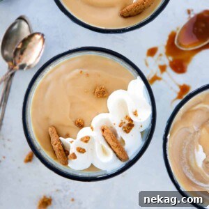 Caramel Pudding in blue glass with whipped cream