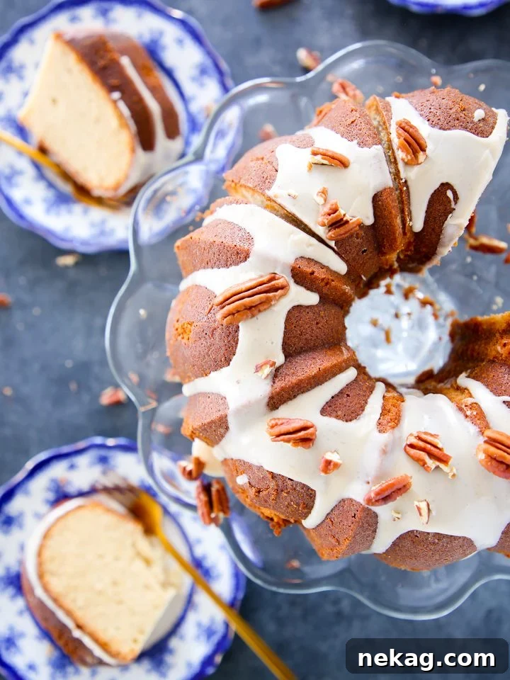 Golden Maple Glazed Pound Cake 3 Close-up of a perfectly baked Maple Pound Cake, showcasing its moist crumb and rich golden-brown color.