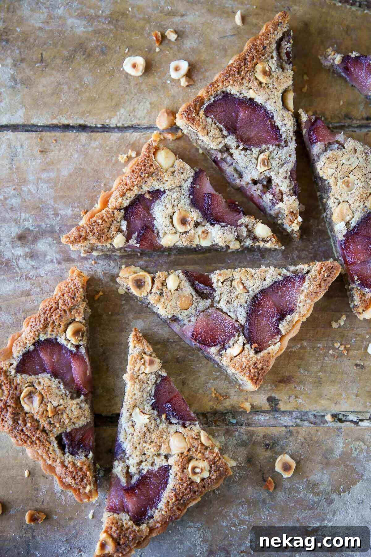 Hazelnut Pear Tart baked in a sweet tart crust, showcasing its perfect golden-brown edges.