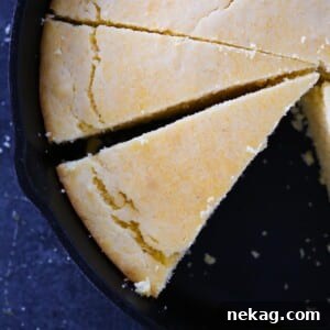 sliced southern cornbread in black cast iron skillet.