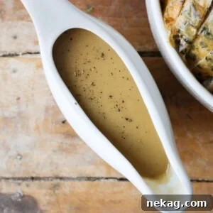 Thanksgiving Traditions A Recipe and Menu Collection 13 A delightful overhead view of gravy made from scratch, a rich and essential component of any Thanksgiving meal.