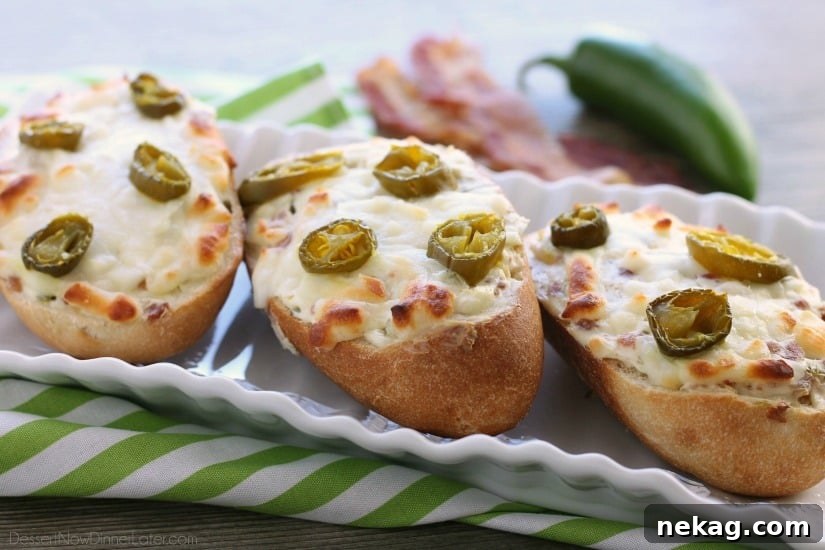Detailed view of a freshly baked Jalapeno Popper Bread, showing the golden-brown edges, melted cheese, and chopped jalapenos, highlighting its inviting texture.
