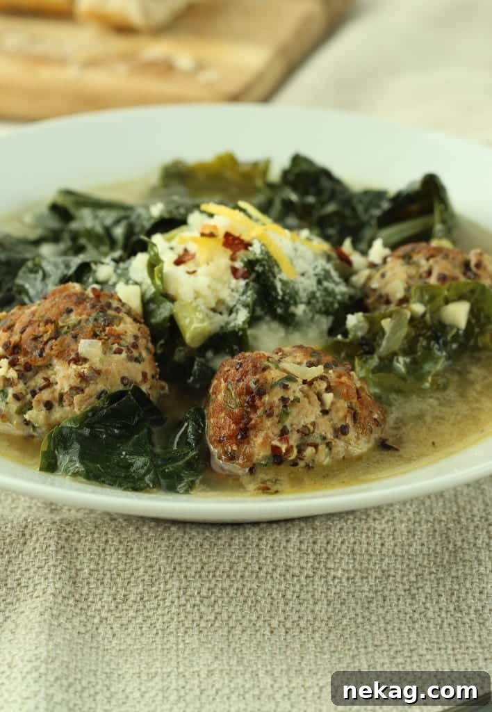 Hearty Turkey Meatball and Kale Soup 4 Close-up of Turkey Meatball and Kale Soup in a bowl