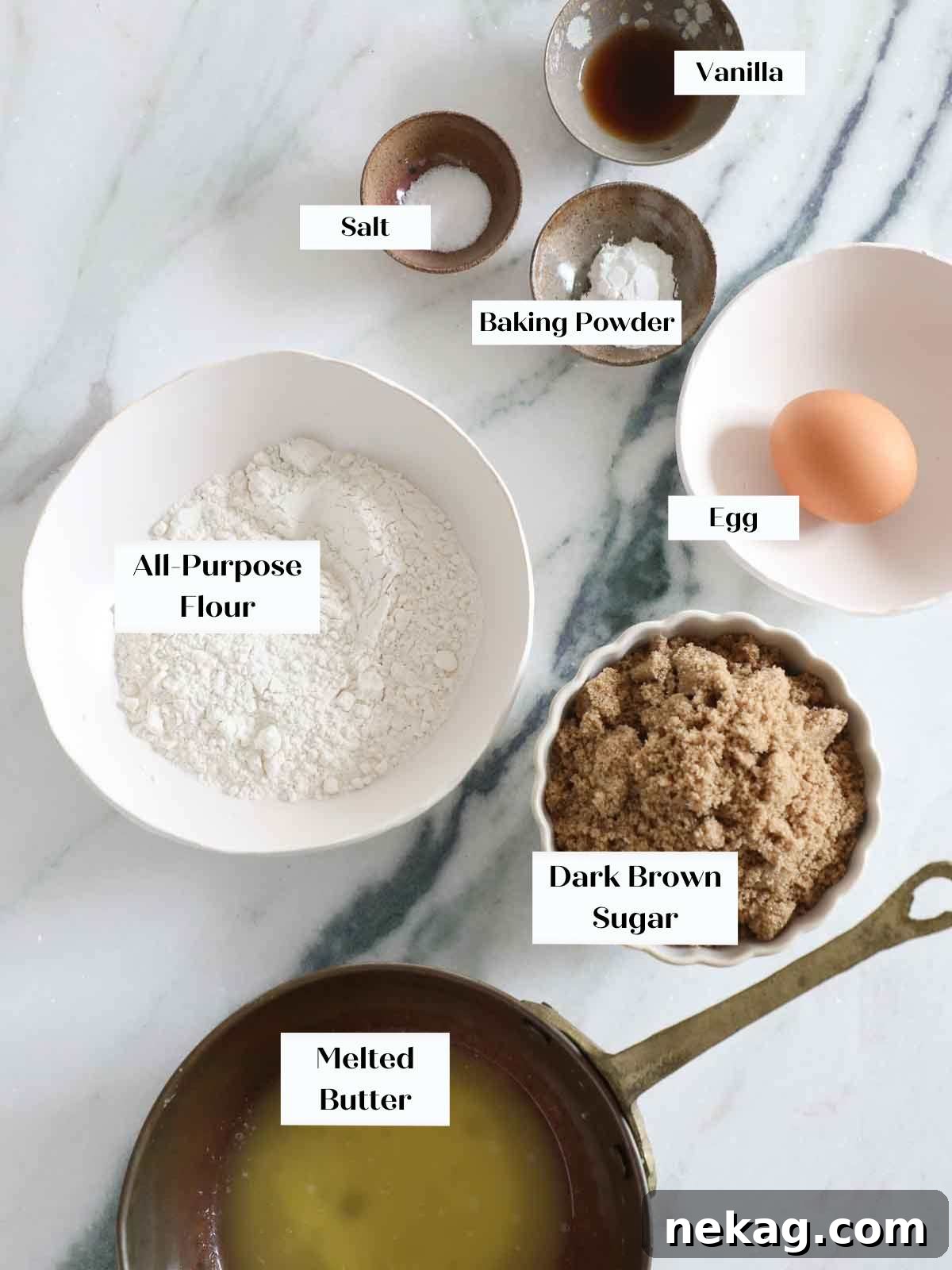 Butterscotch brownies ingredients laid out on a marble surface.