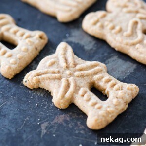 Homemade Speculoos Cookies on a baking sheet, ready to be enjoyed.